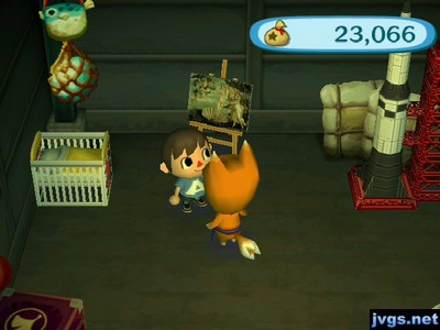 A baby bed, a moving painting, and a rocket for sale at Crazy Redd's shop.