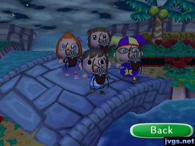 Jeff, Megan, Yann, and Phoebe holding up goliath beetles.