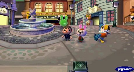 Me holding a green bunny balloon next to Gabi.