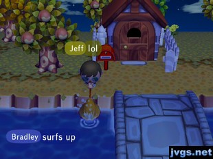 Bradley says "surfs up" as Jeff splashes his net in the river.