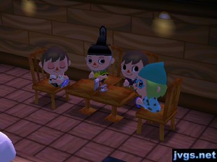 Four players enjoying a performance from K.K. Slider in the Roost in ACCF.