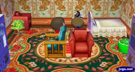 Kitty flips upside down as she takes some medicine in Animal Crossing: City Folk (ACCF) for Nintendo Wii.