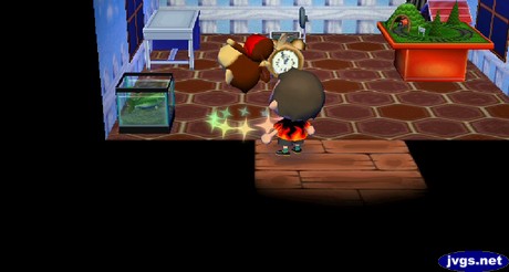 Champ the monkey flips as he takes some medicine in Animal Crossing: City Folk.