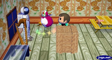 Midge flips upside-down as she takes her medicine in Animal Crossing: City Folk.
