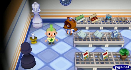 A white bishop, a candle, and a black pawn are the three items for sale at Nook's shop.