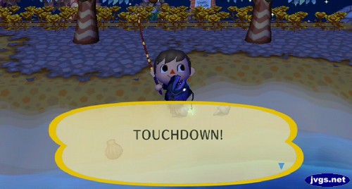 Jeff, holding a football fish: TOUCHDOWN!