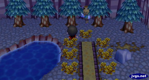 Saharah walking between some trees at the north end of town.