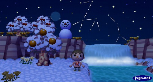 A snowman near the top of a waterfall looks out.