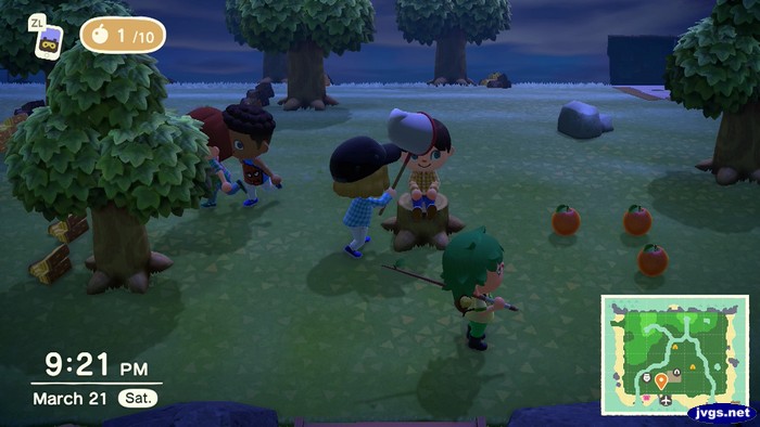 Megan hits Jeff with a net.