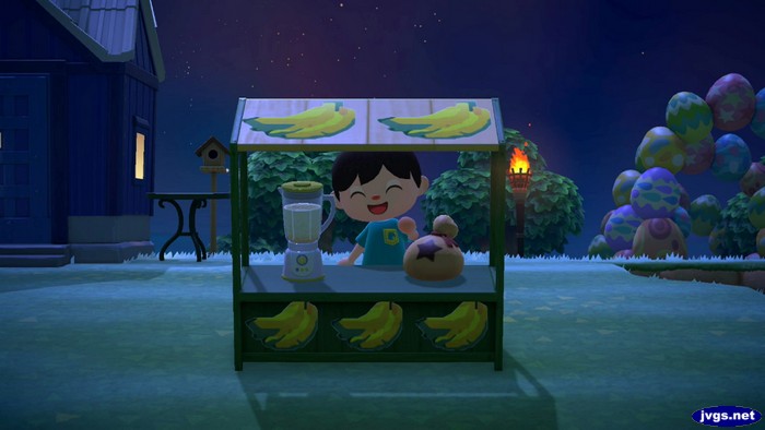 Jeff stands at the banana stand.