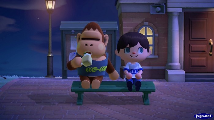 Louie takes a drink while sitting on a bench in ACNH.