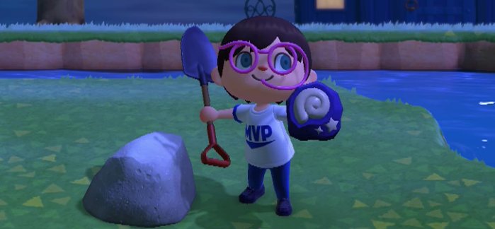 Jeff wears drinking-straw glasses as he digs up a fossil.