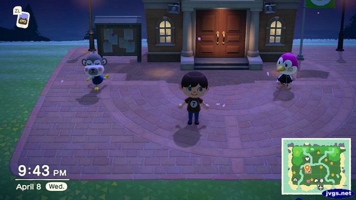 Shari performs yoga poses in front of town hall.