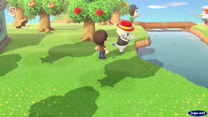 Tia, Marcel, and Midge fish in the river while wearing hats.