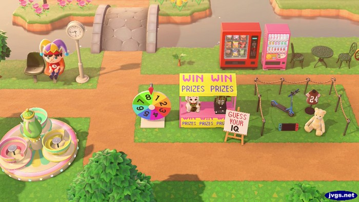 The amusement park in Forest, featuring a teacup ride, a Guess Your IQ game stand, prizes, and snacks.