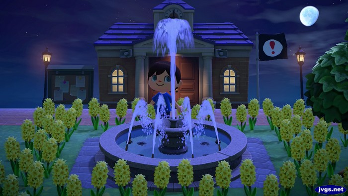 The fountain sprays water high into the air in Animal Crossing: New Horizons.