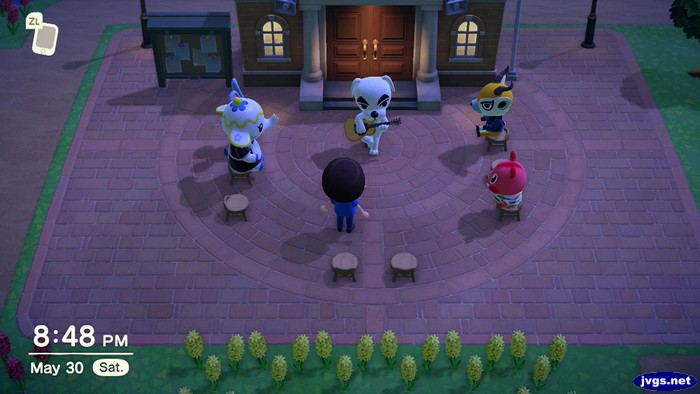 Rizzo, Tia, Jeff, Apple, and Lopez surround K.K. Slider in Animal Crossing: New Horizons.