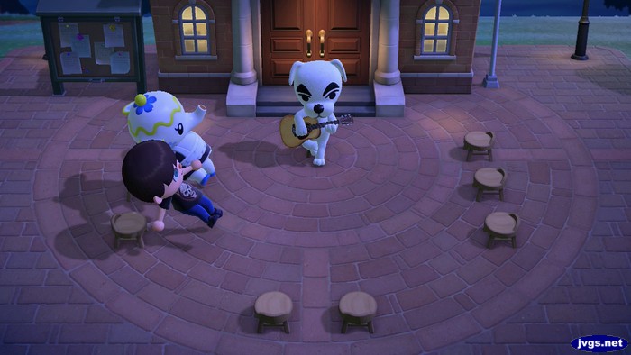 Jeff and Tia hop out of their chairs as K.K. Slider starts to perform.