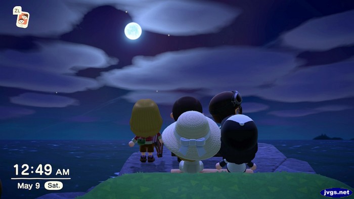 Five players look at the moon in ACNH.