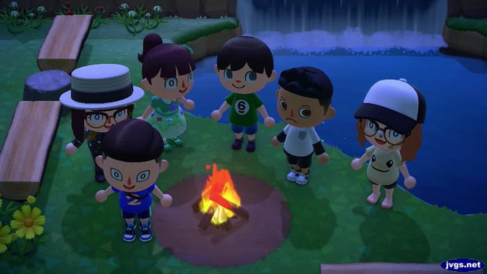 Logan, Ros, Nami, Jeff, Ryan, and Timo pose for a photo at the campfire.