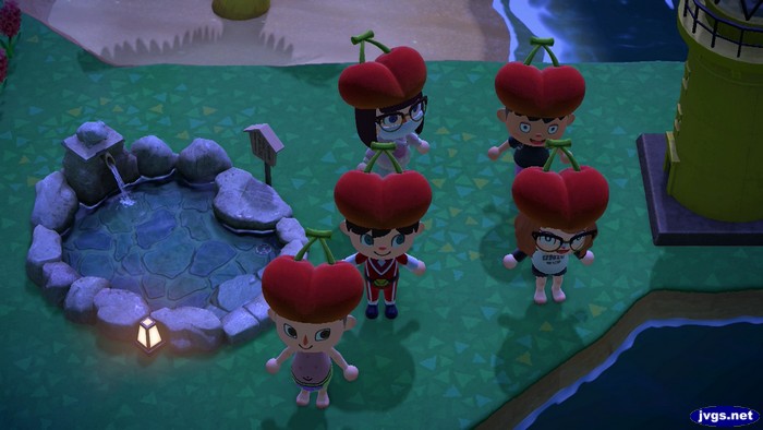 The five of us wearing cherry hats in Animal Crossing: New Horizons.