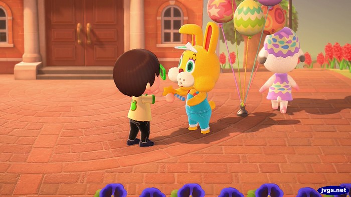 Zipper hands me a bunny wand.