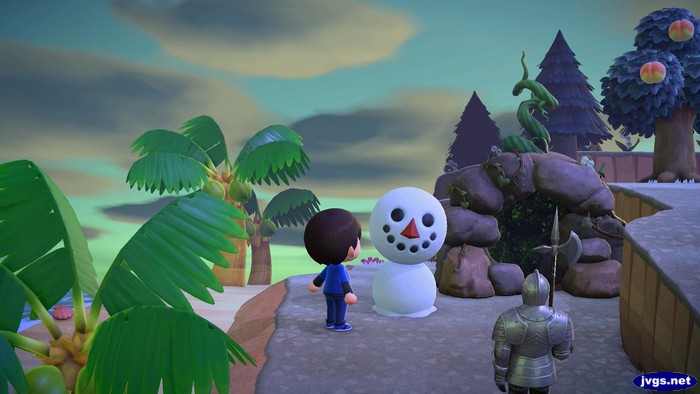 A snowman in the early hours of spring.