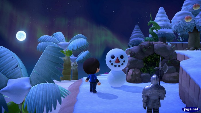 My lopsided snowman built at the end of winter.