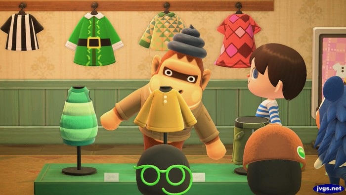 Louie sizes up a henley shirt. I think it's too small for him.