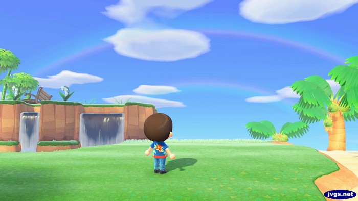 Looking up at a rainbow in Animal Crossing: New Horizons.