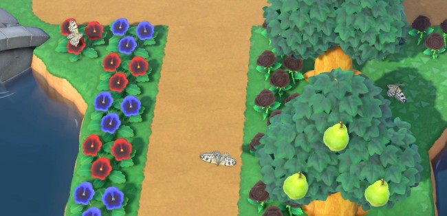 Three paper kite butterflies on-screen in ACNH.