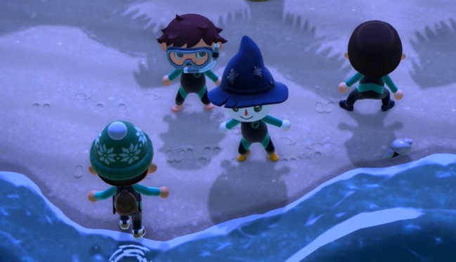 The four of us crab walking on the beach.