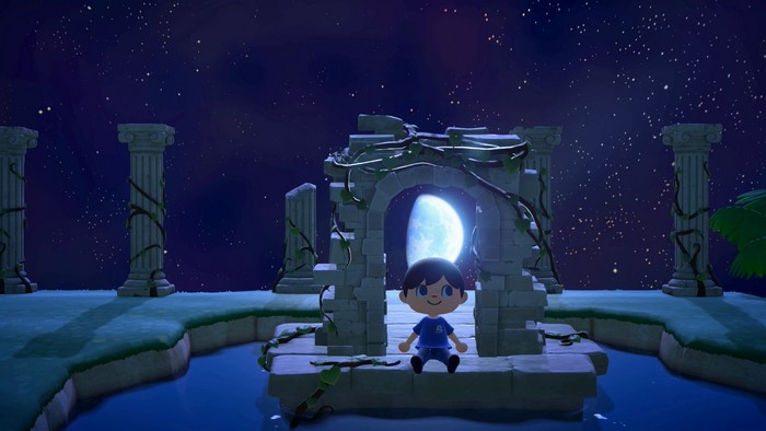 The moon shines through the arch on Lottie's Island.
