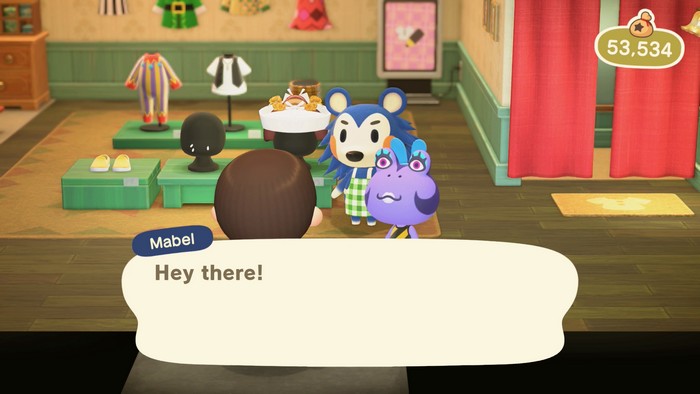 Diva walks over and stares in my face as Mabel welcomes me to Able Sisters.
