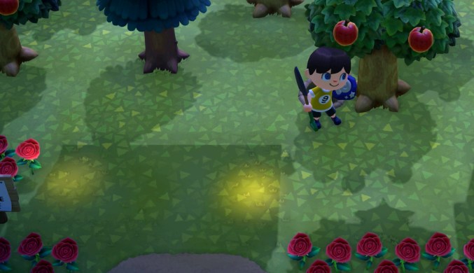 Lights shine on the ground under Louie's house.