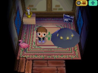 The flying saucer on display in my Animal Crossing: Wild World house.