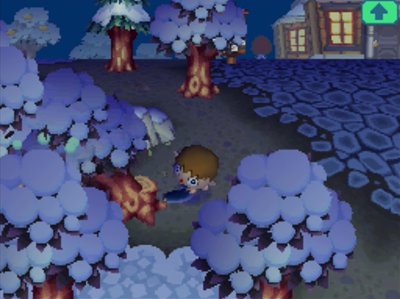 Using an axe to cut down a tree in Animal Crossing: Wild World.