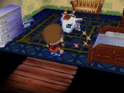 Chevre the goat takes her medicine.