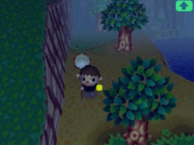 A squarish firefly flies near my face in Animal Crossing: Wild World.