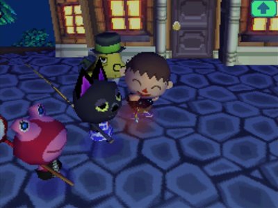 Kiki and Puddles walk by as I set off a sparkler in Animal Crossing: Wild World.