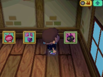 Looking at Kiki's pic in my house in ACWW.