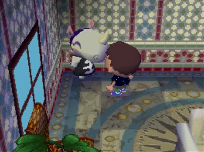 Rhonda puts on a bone shirt in Animal Crossing: Wild World.