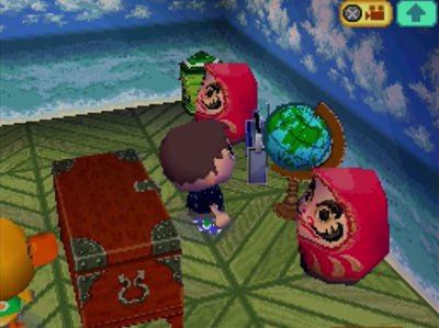 Two dharmas in Joey's house in Animal Crossing: Wild World.