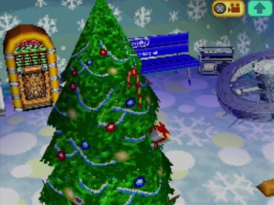 My big festive tree and space station in my Animal Crossing: Wild World house.