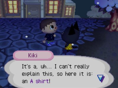 Kiki: It's a, uh... I can't really explain this, so here it is: an A shirt!