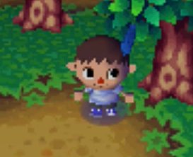 Jeff wearing a cloudy shirt and a blue feather in Animal Crossing: Wild World.