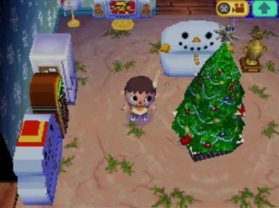 The western desert carpet on display in my house, along with snowman furniture and a large festive tree.