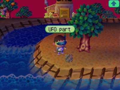 A UFO part on the ground in Animal Crossing: Wild World.
