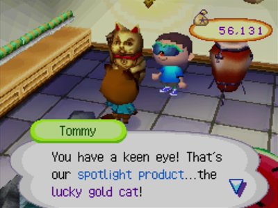 Tommy: You have a keen eye! That's our spotlight product...the lucky gold cat!
