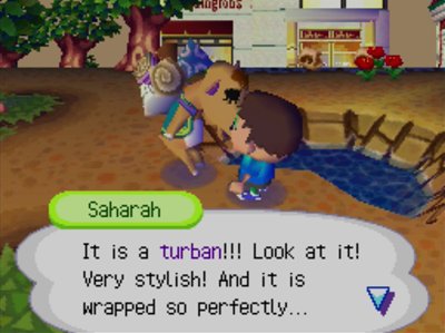 Saharah: It is a turban!!! Look at it! Very stylish! And it is wrapped so perfectly...